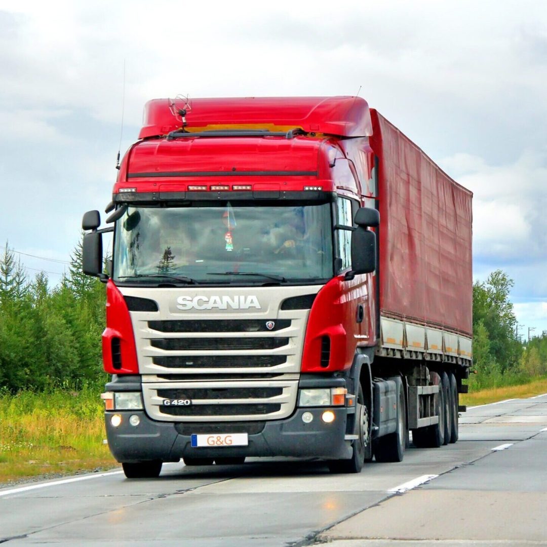 a red truck on a road